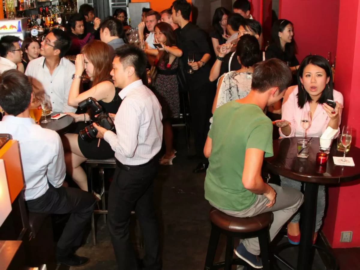 friday night situation when people enjoy their drink together with friends