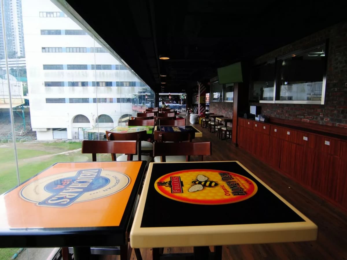 american style bistro combines indoor seating with a large al fresco area overlooking the grassy football field