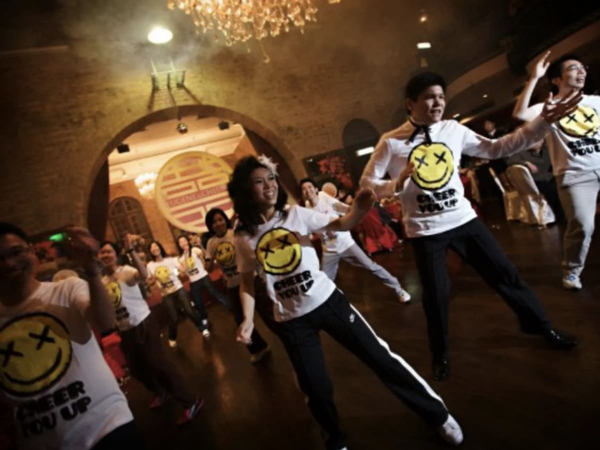 team bonding dance activity at the dance floor using the same clotch