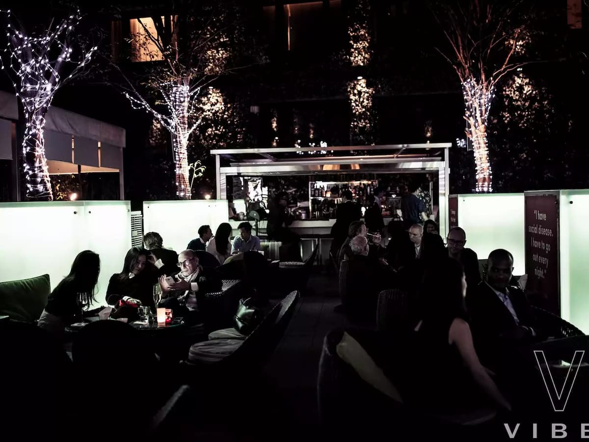 guests dining at the mira hotel vibes restaurant