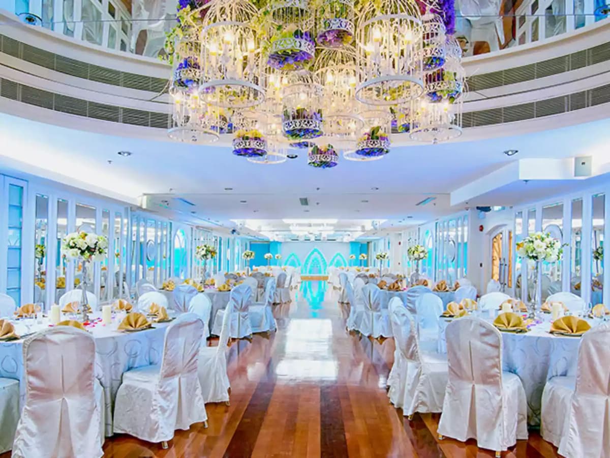 banquet halls using grand chandelier from bird cage