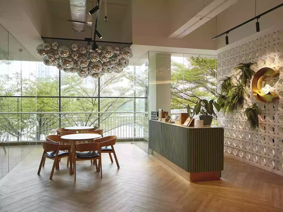 artsy lobby of common ground ara damansara with silver balls on the ceiling