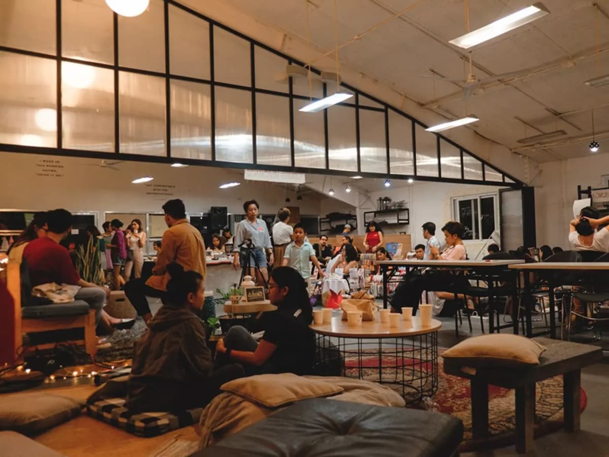 gathering space in makati with high ceiling and several floor cushions