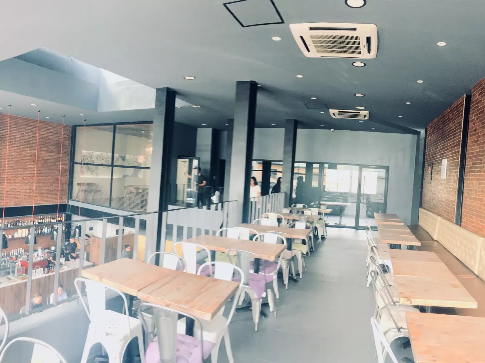 makati event space with two floors and brick wall