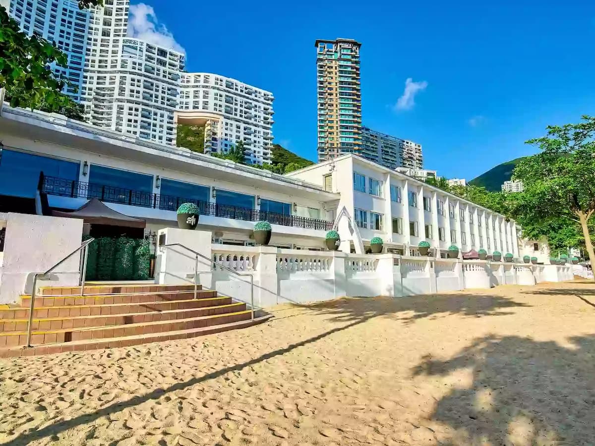 the exterior look of clubone repulse bay overlooked the beach area