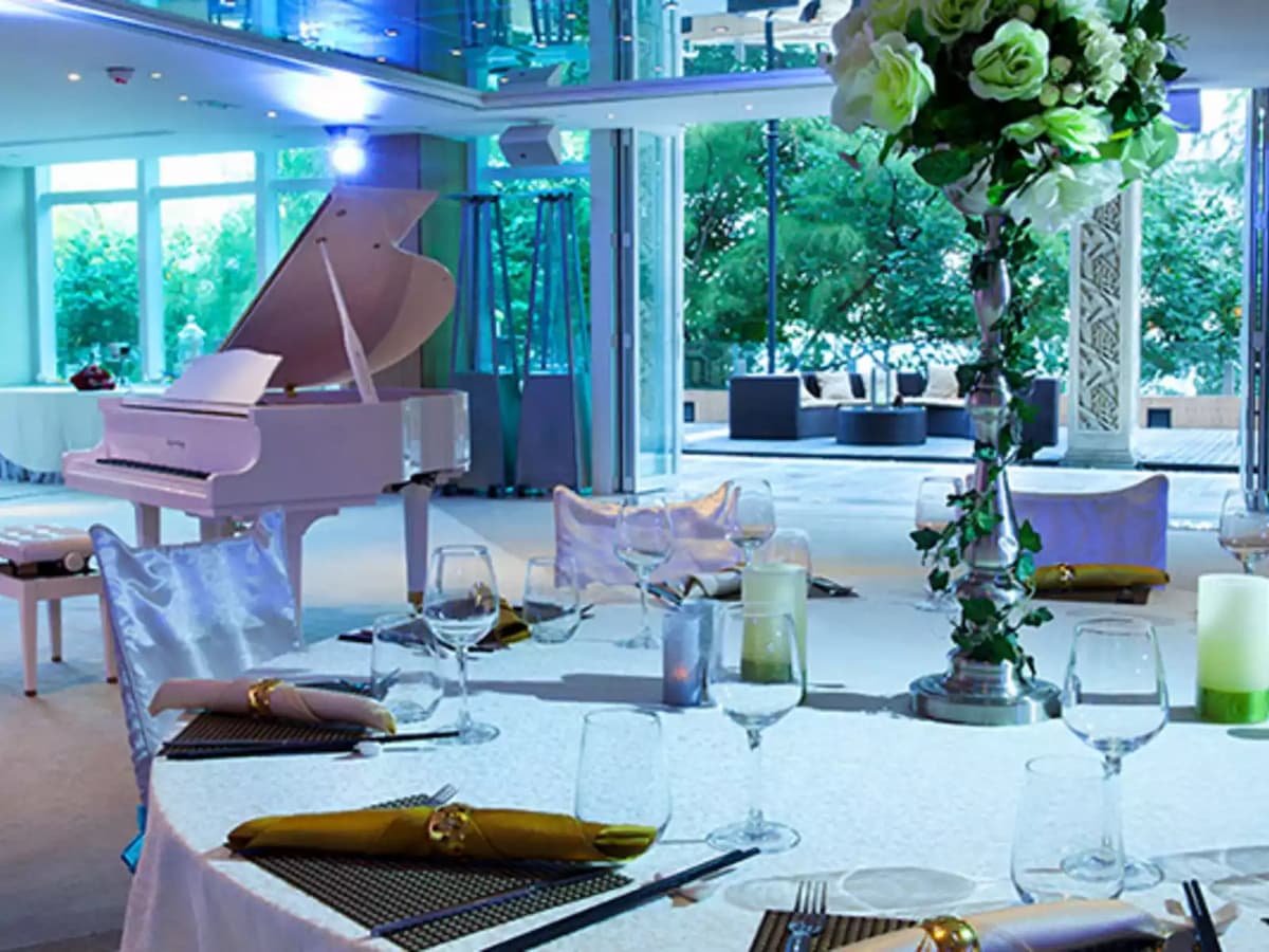 banquet style seating overlooked the white grand piano
