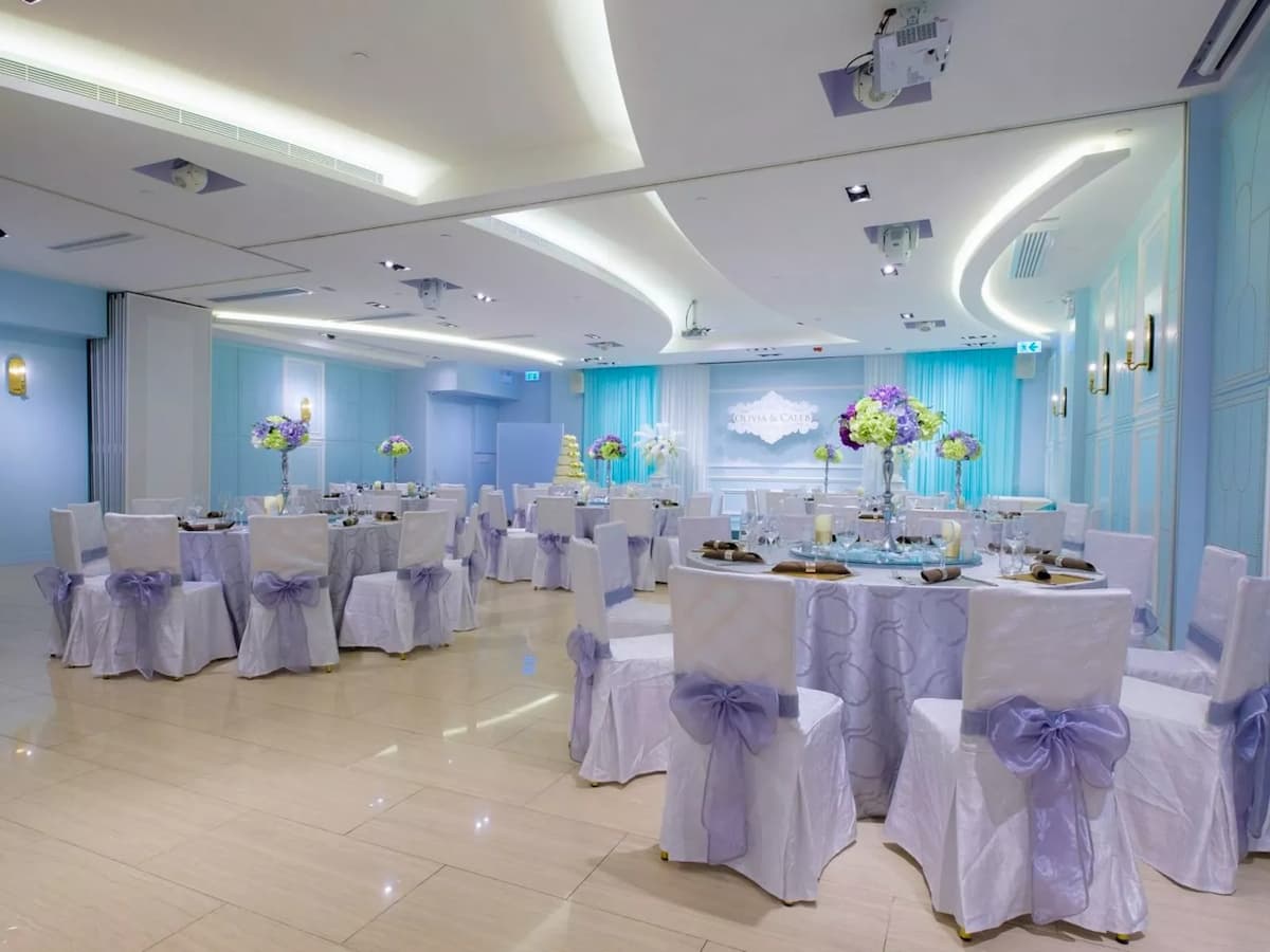 function hall with round table setup for intimate wedding dinner