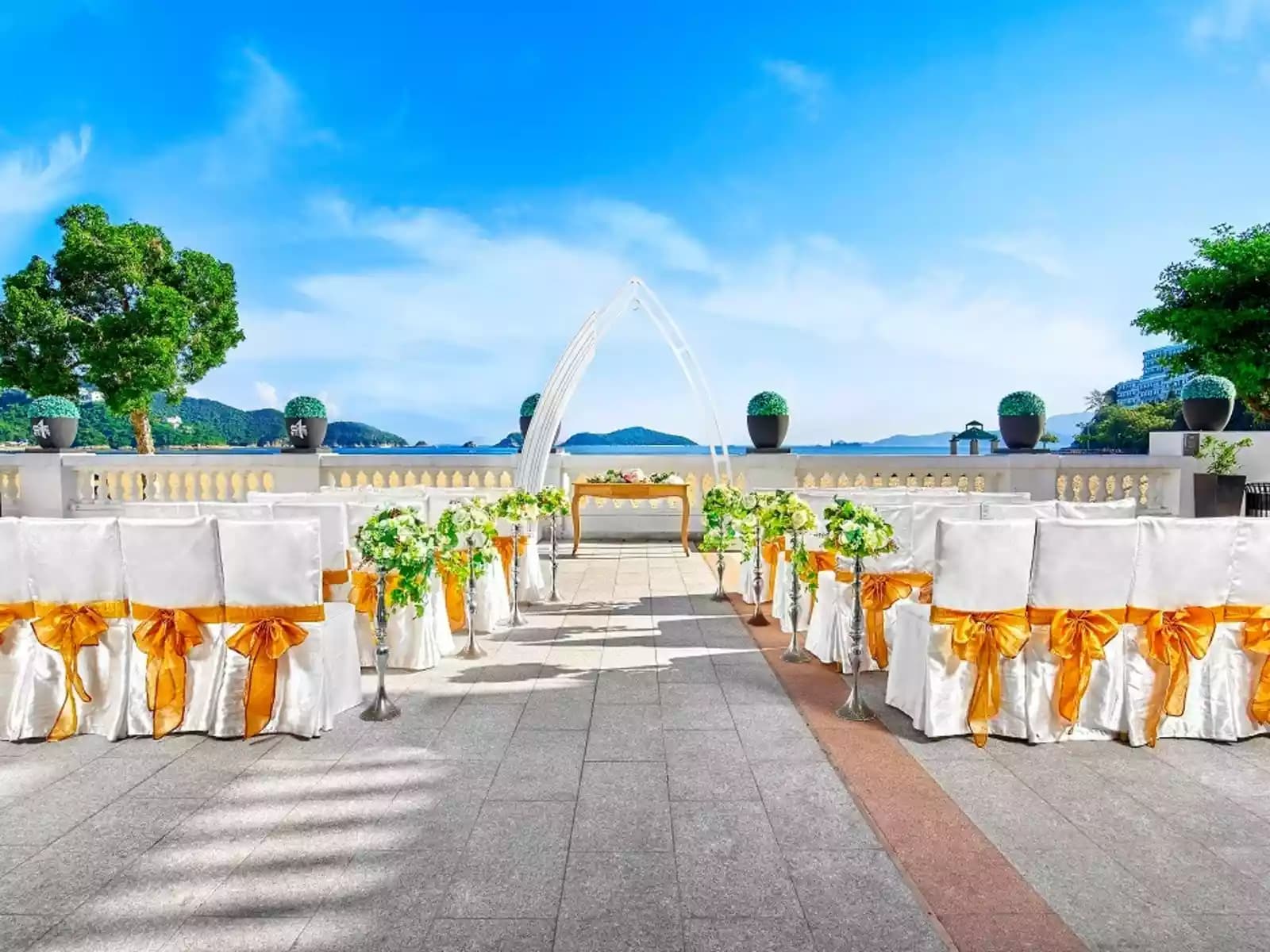 outdoor wedding solemnisation setup with the view of the sea