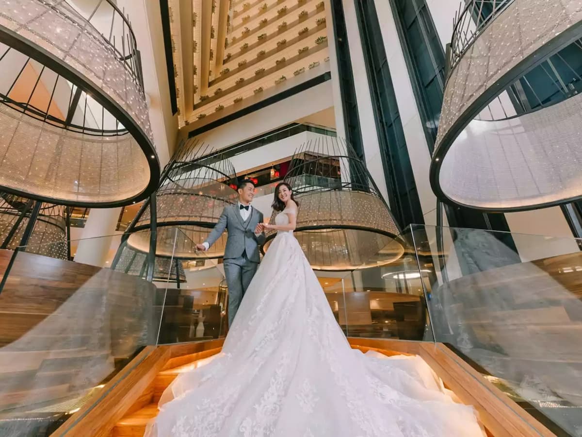 bride and groom on a stunning stairs