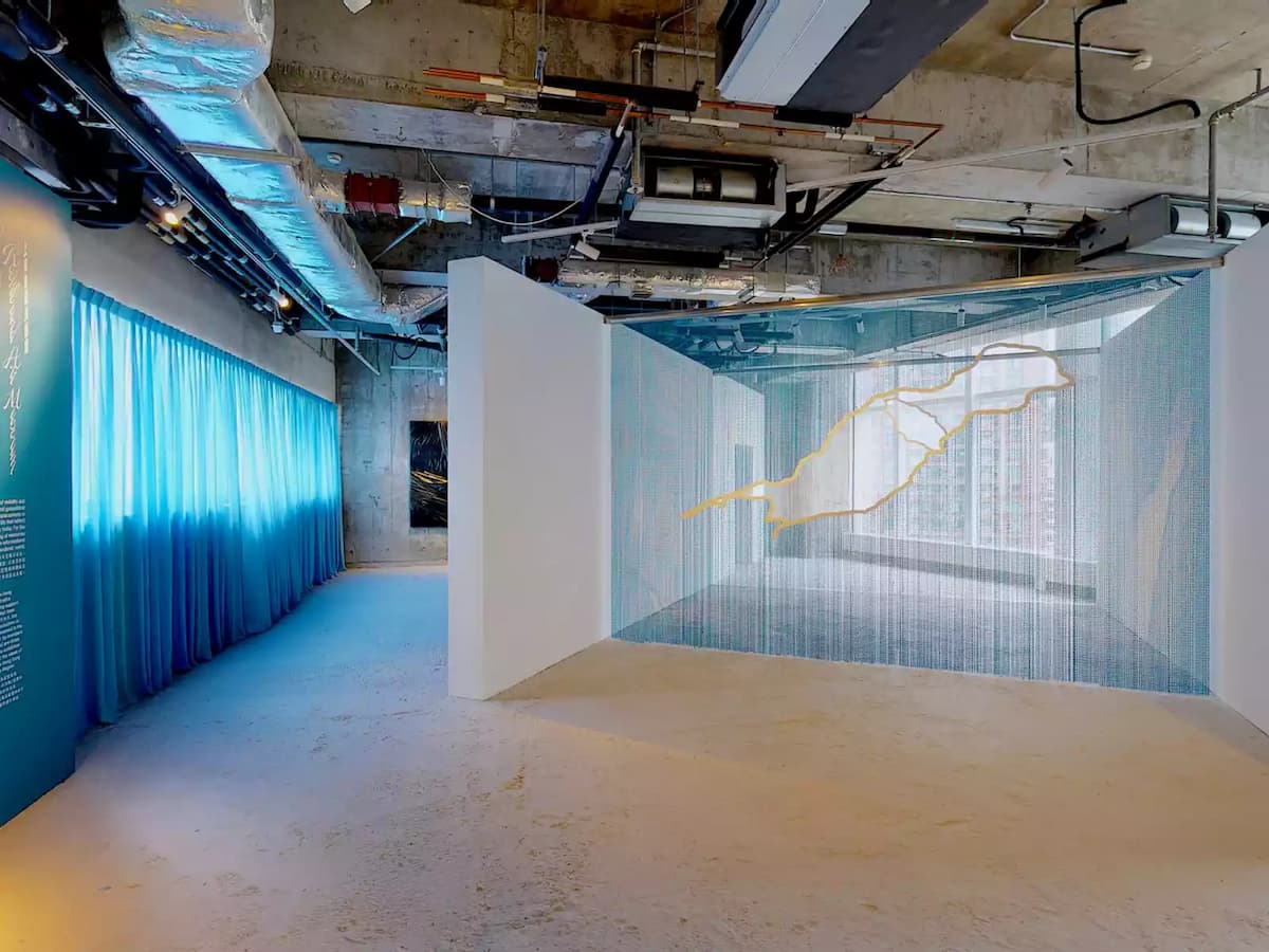 large function room with blue curtains