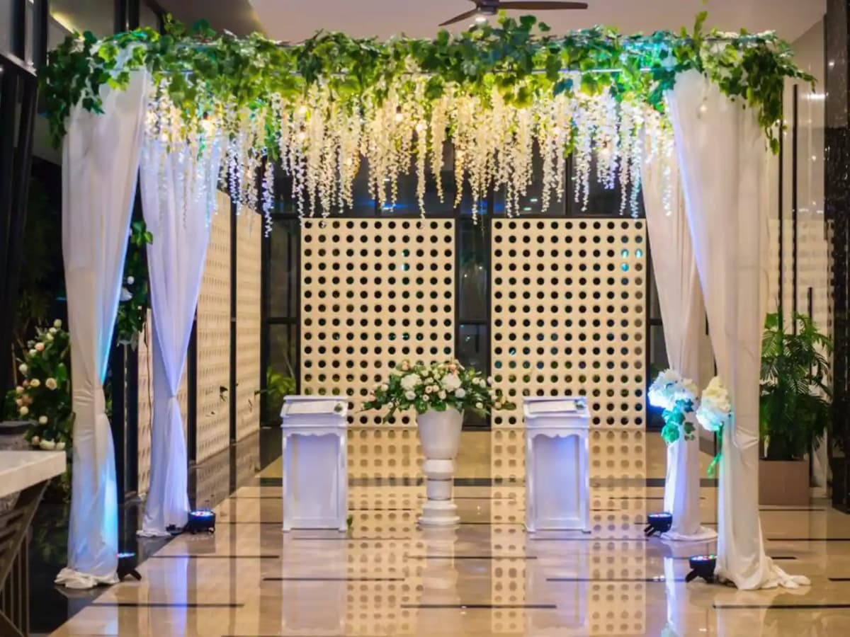 Ceremony area with flowers and white cloth