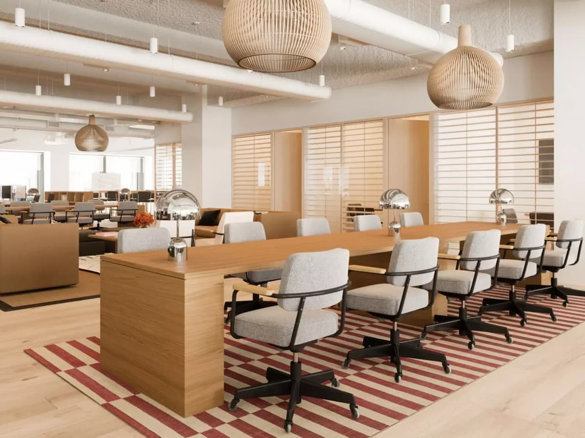 meeting venues singapore with long table and grey chairs at the coworking area