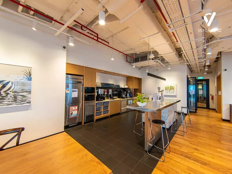 spacious fully functional kitchen with dining bar for team building venues for rent singapore