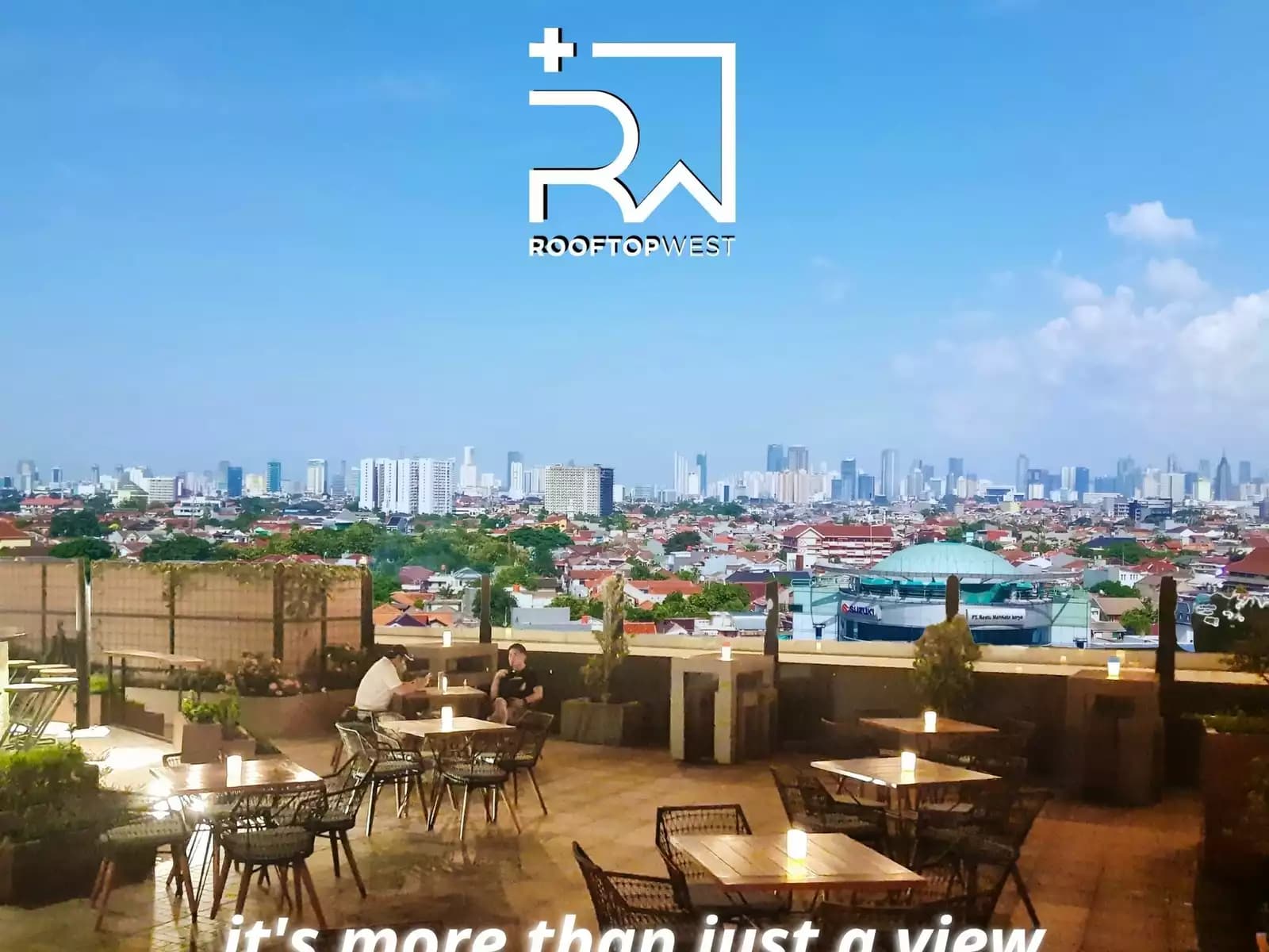 corporate event venue for rent with spacious outdoor rooftop dining area overlooking the city