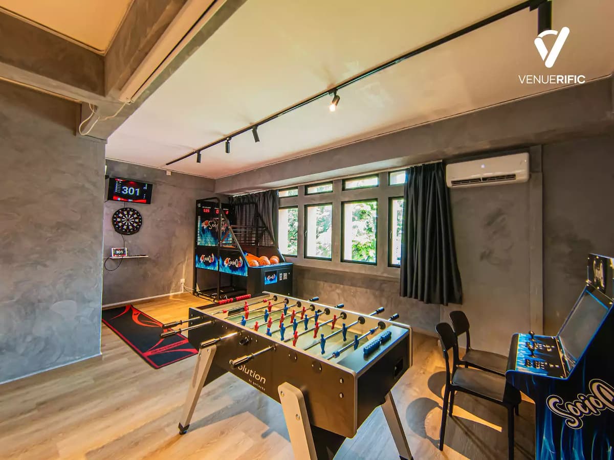 foosball table and other arcade games like darts and basketball