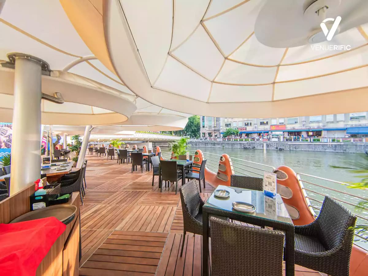 row of tables and chairs in patio area