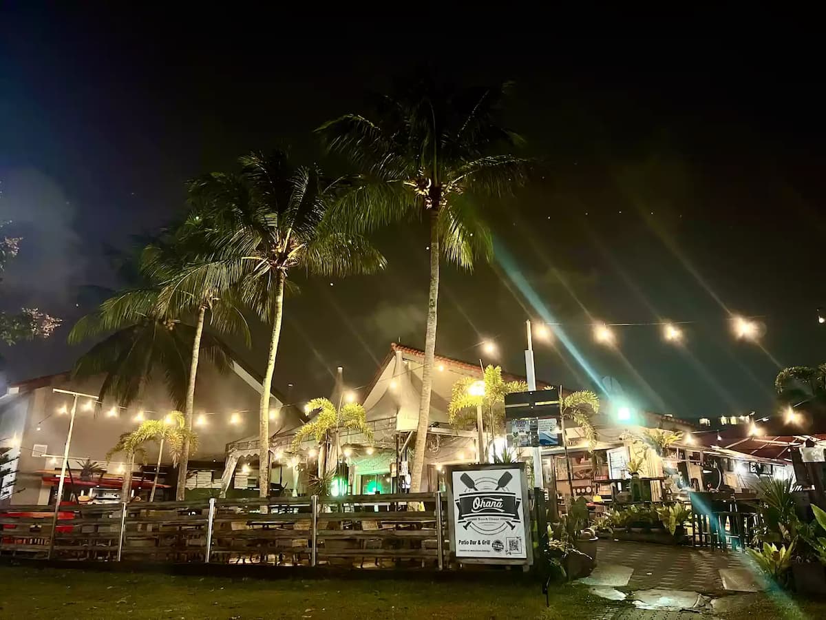 beach restaurant with coconut trees