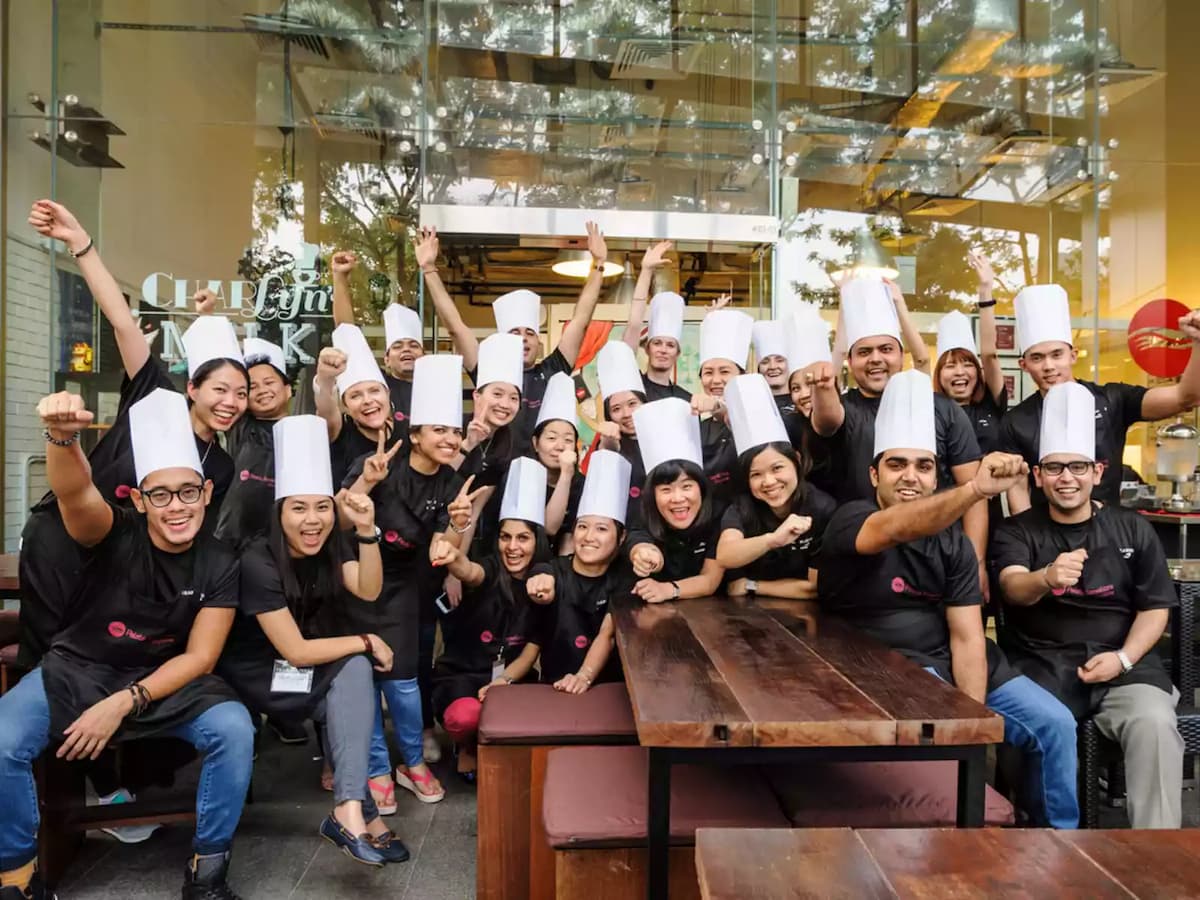 group photo of happy chefs