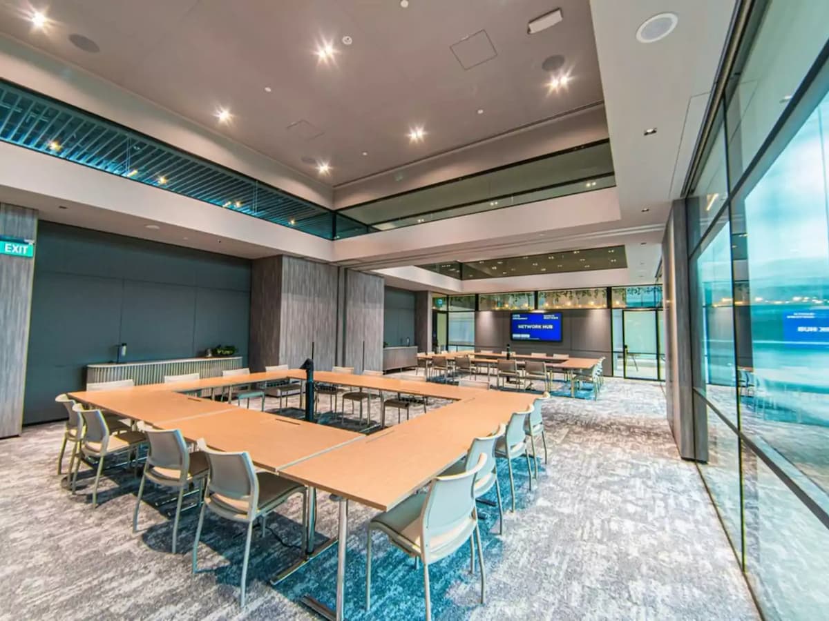 large room with conference tables and chairs