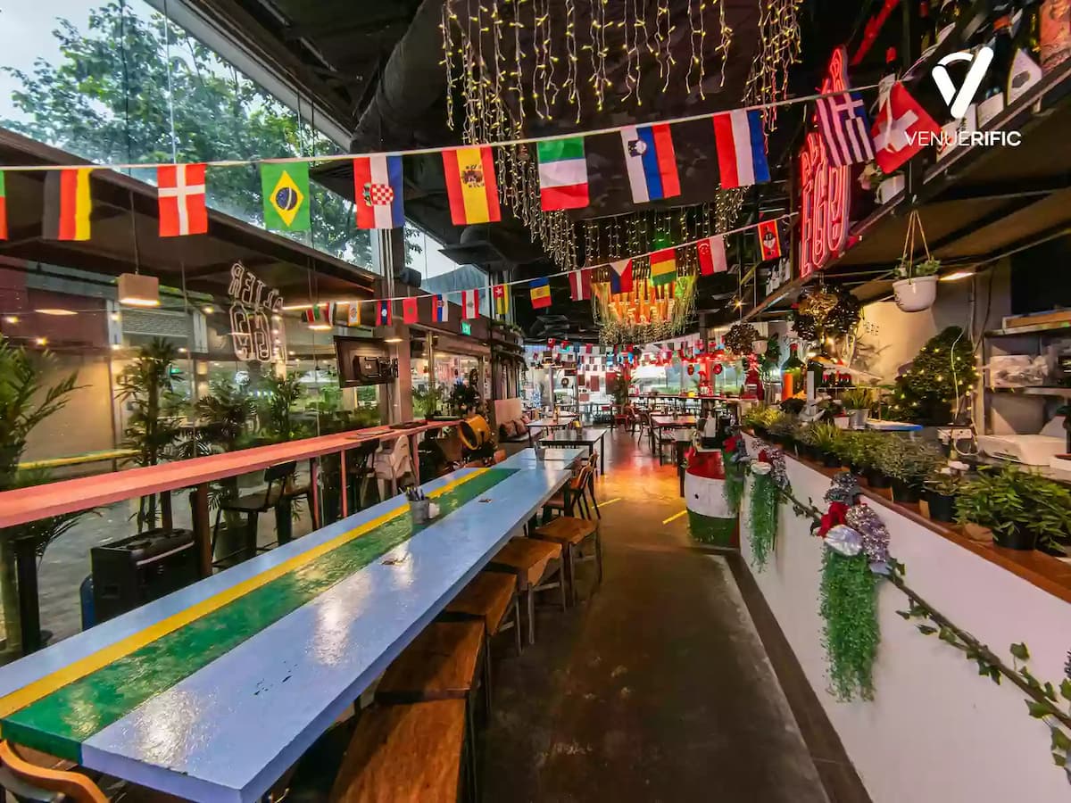 outdoor patio dining area with flag decorations