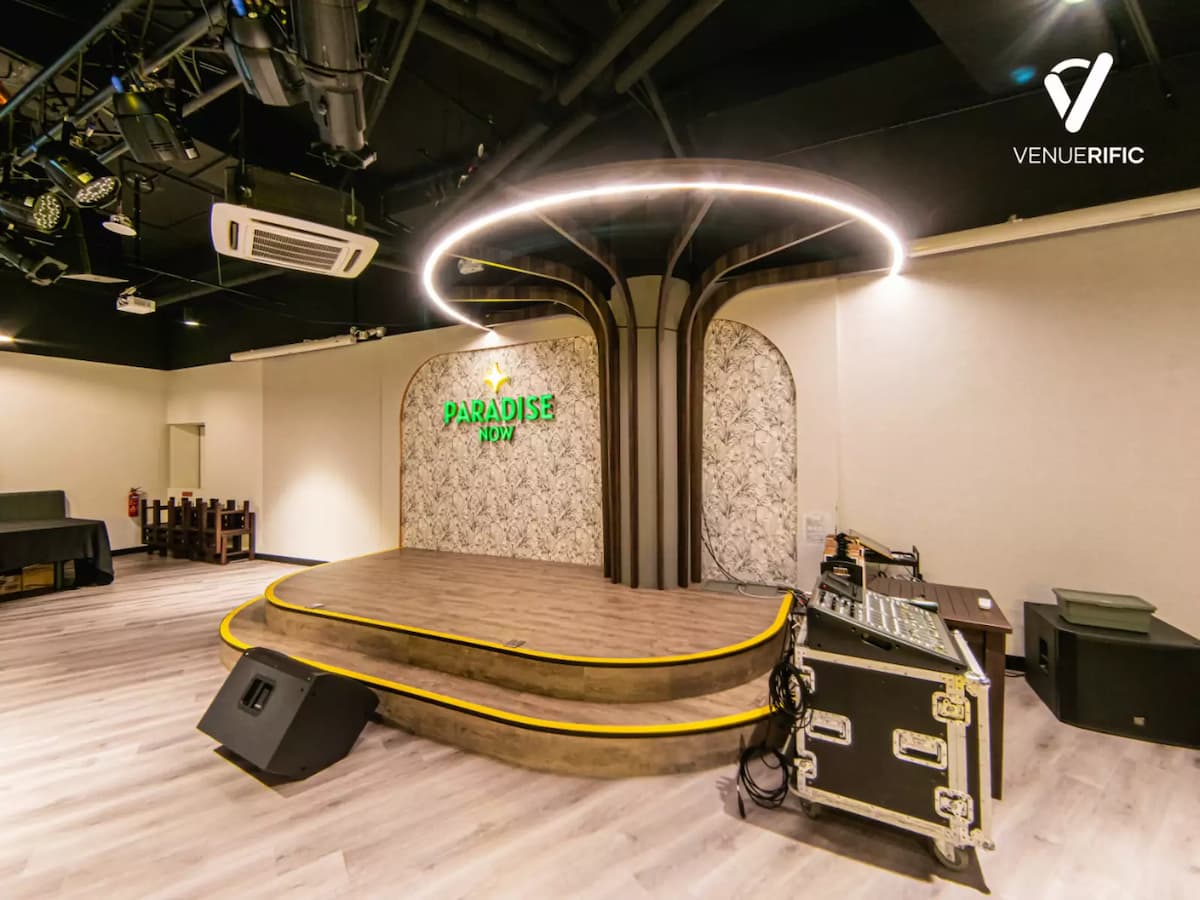 small stage with sound system on the side