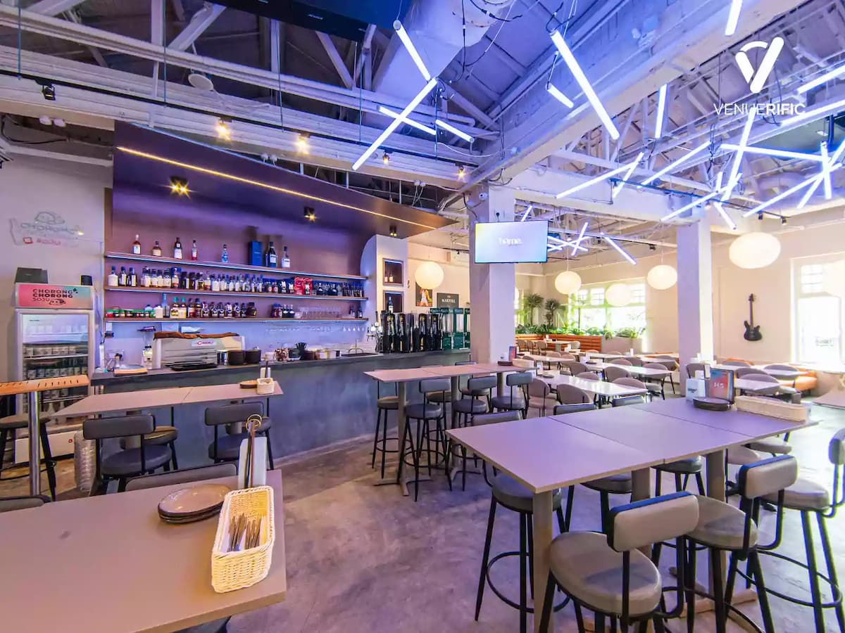 bar and dining hall with tv