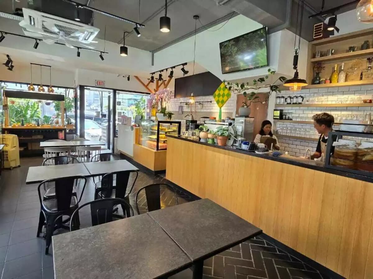 industrial themed cafe with large coffee bar counter