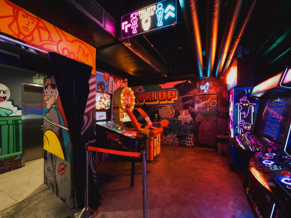 arcade with neon lighting in private area