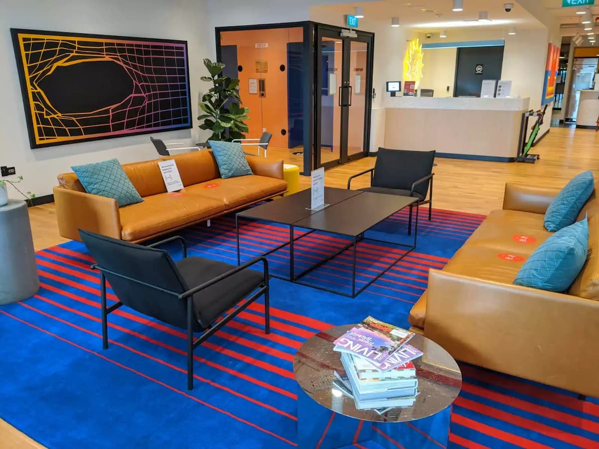 sofas, chairs, and magazines in retro receiving area