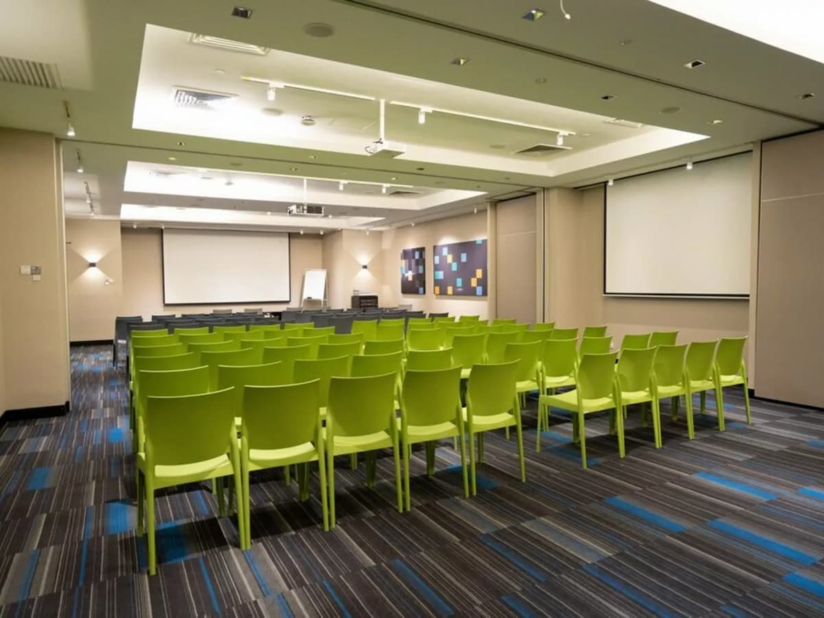 spacious corporate training space setup with theatre seating style