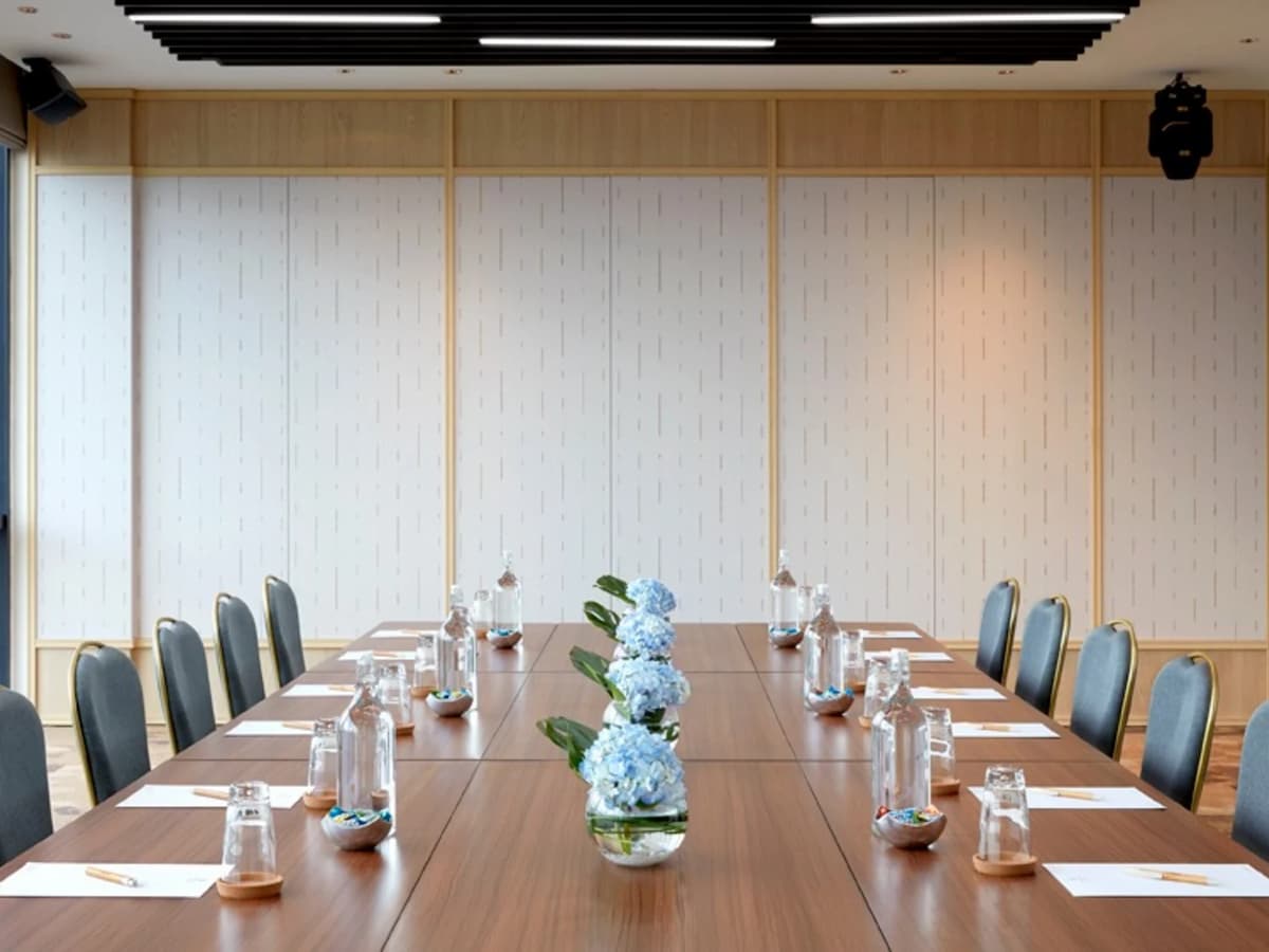 a long table with flower centerpiece