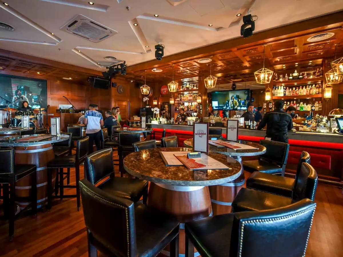 a bar with cocktails section and good lighting