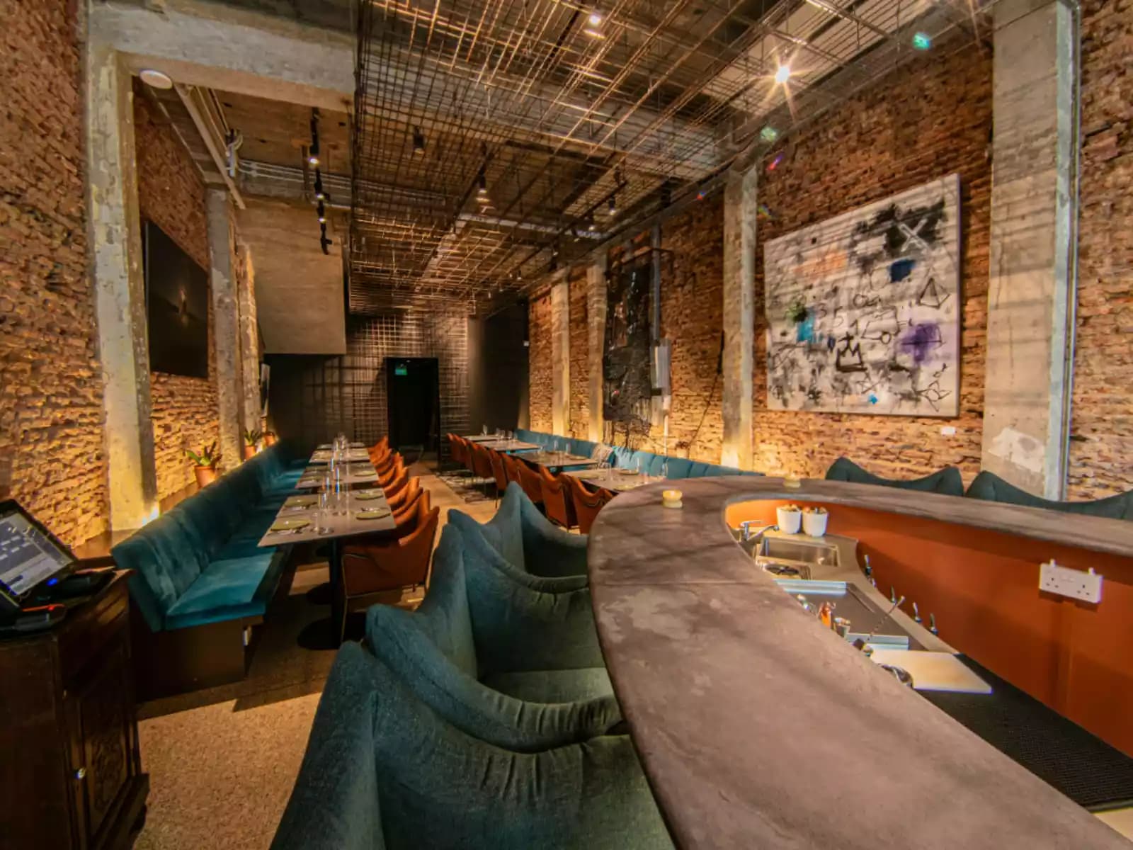 stylish dining setup at tempt venue for private events in singapore with cozy ambiance