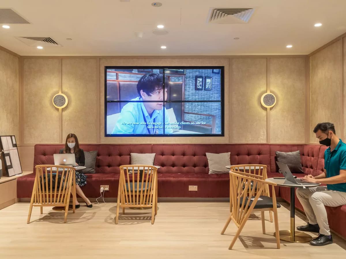 people working in a cozy workspace