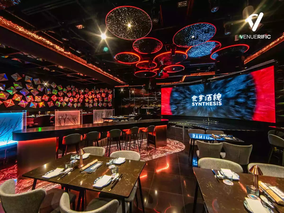 modern dining setup with vibrant lighting and sleek decor at synthesis event space