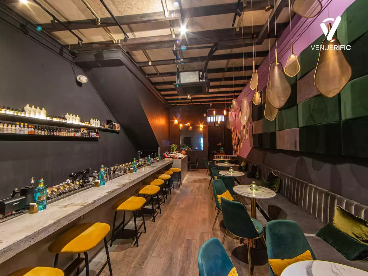 lounge bar area with seating, modern decor, and ambient lighting