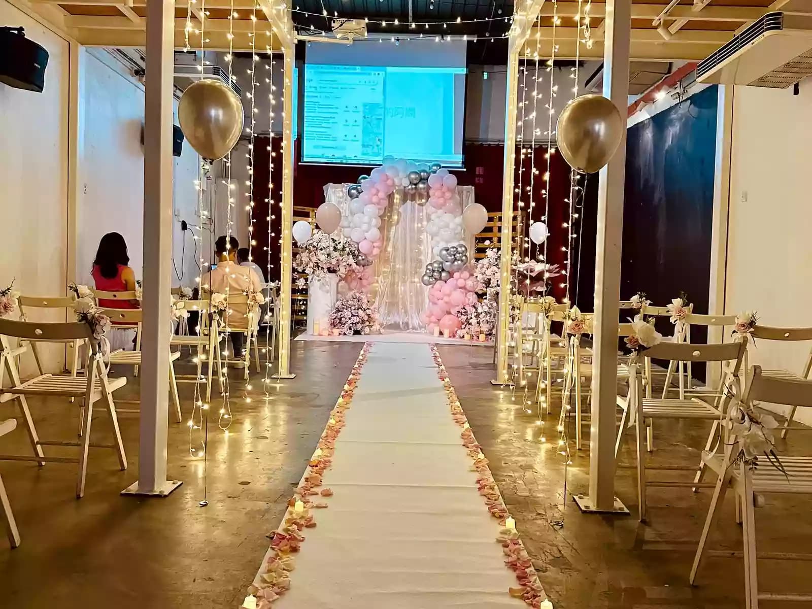 multi level venue with intimate setup and fairy lights