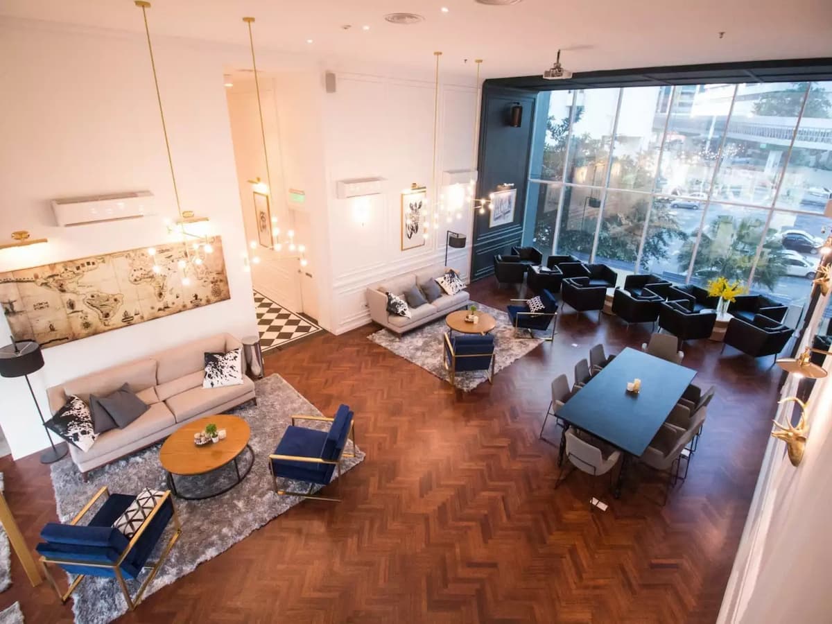 spacious and elegant lounge area with a mix of seating options