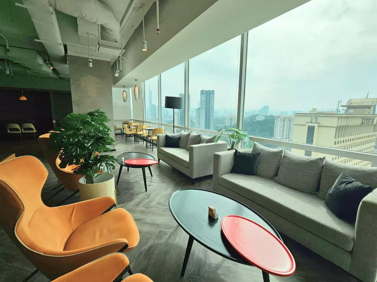 a stylish lounge area with a panoramic city view.