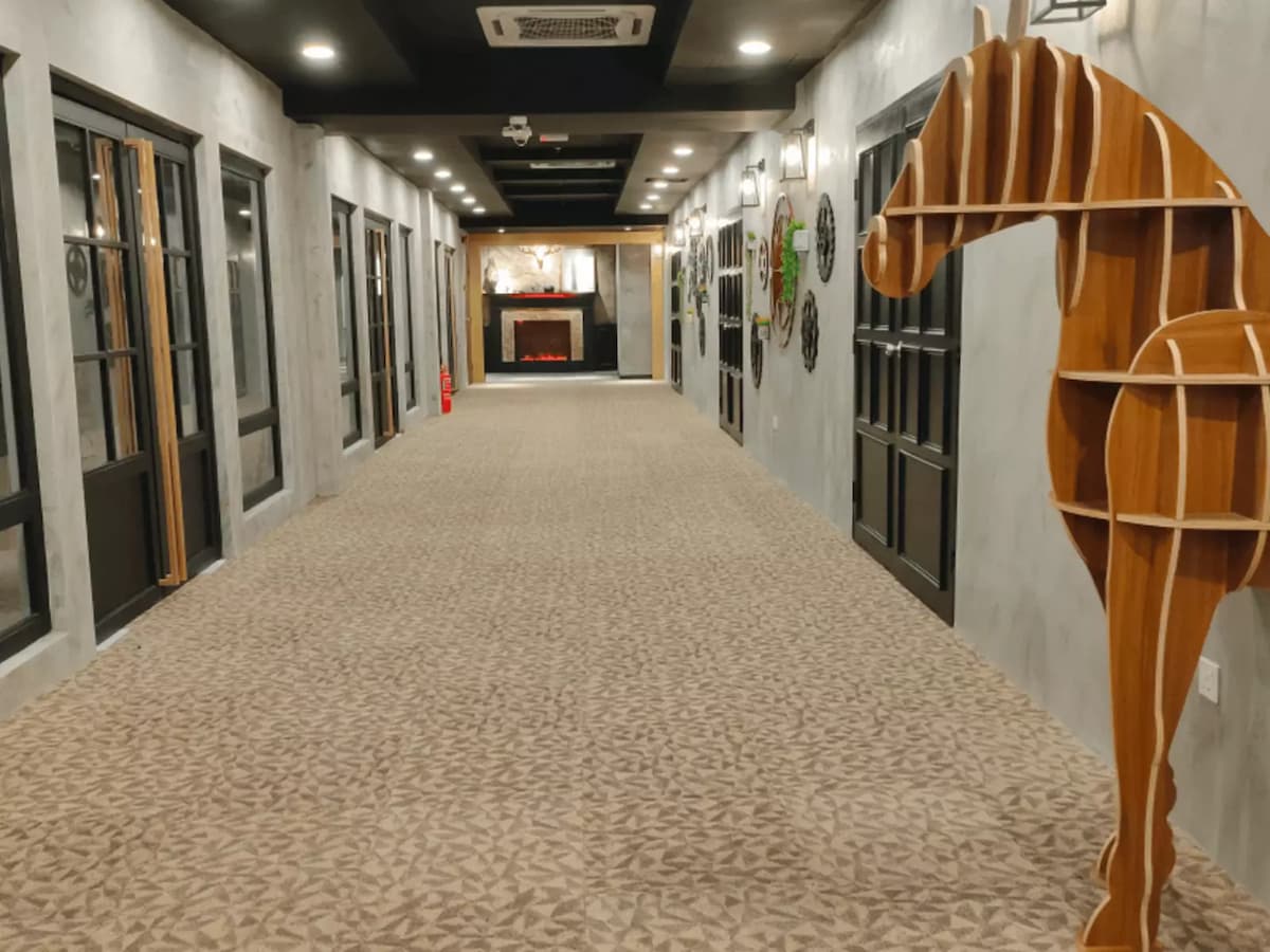 A stylish hallway with a warm and modern-industrial aesthetic