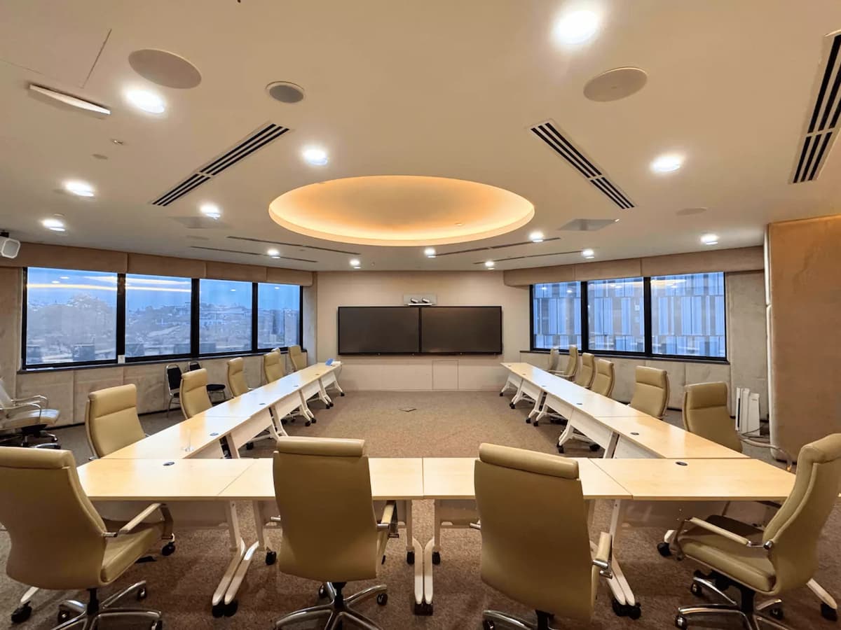modern meeting room with 'u shape table featuring city view