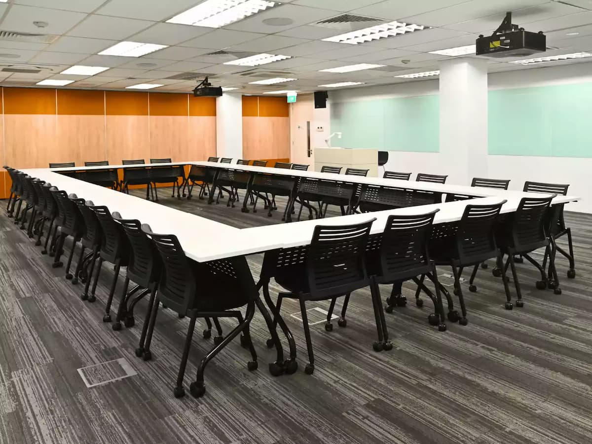 well-equipped and professional space with u-shaped tables set up