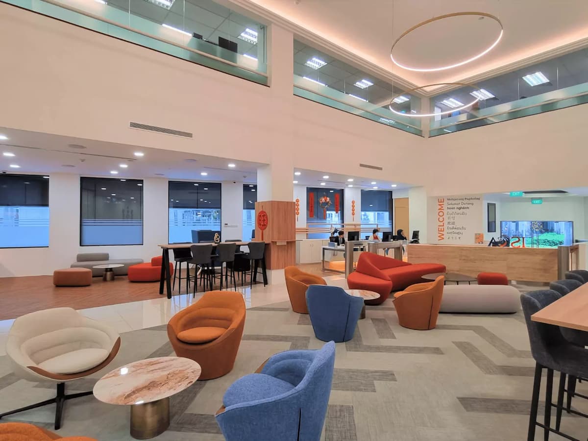 lounge area with vibrant seating and high ceilings