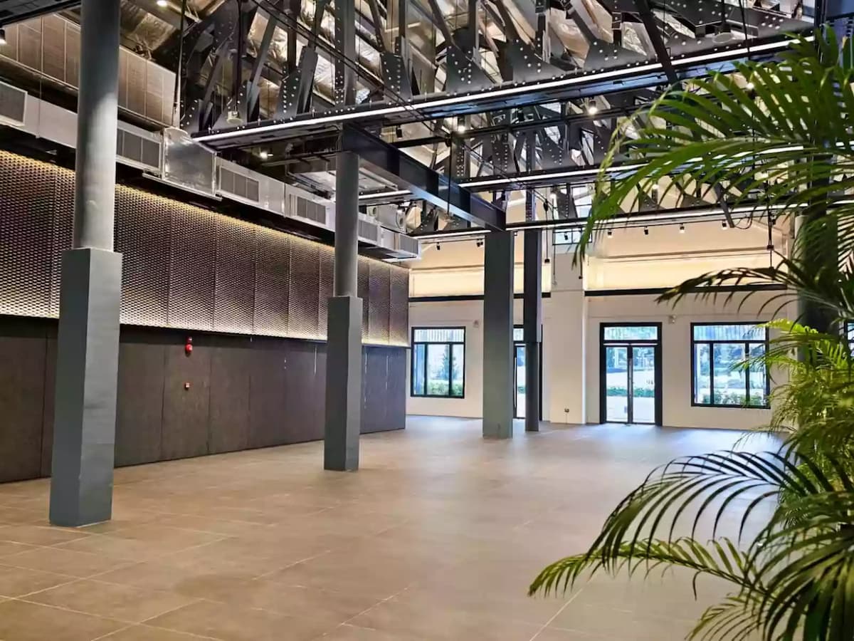 elegant open-concept area featuring a contemporary industrial design
