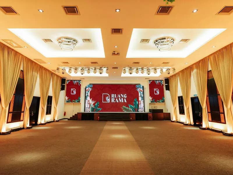 an elegant stage with large LED screens