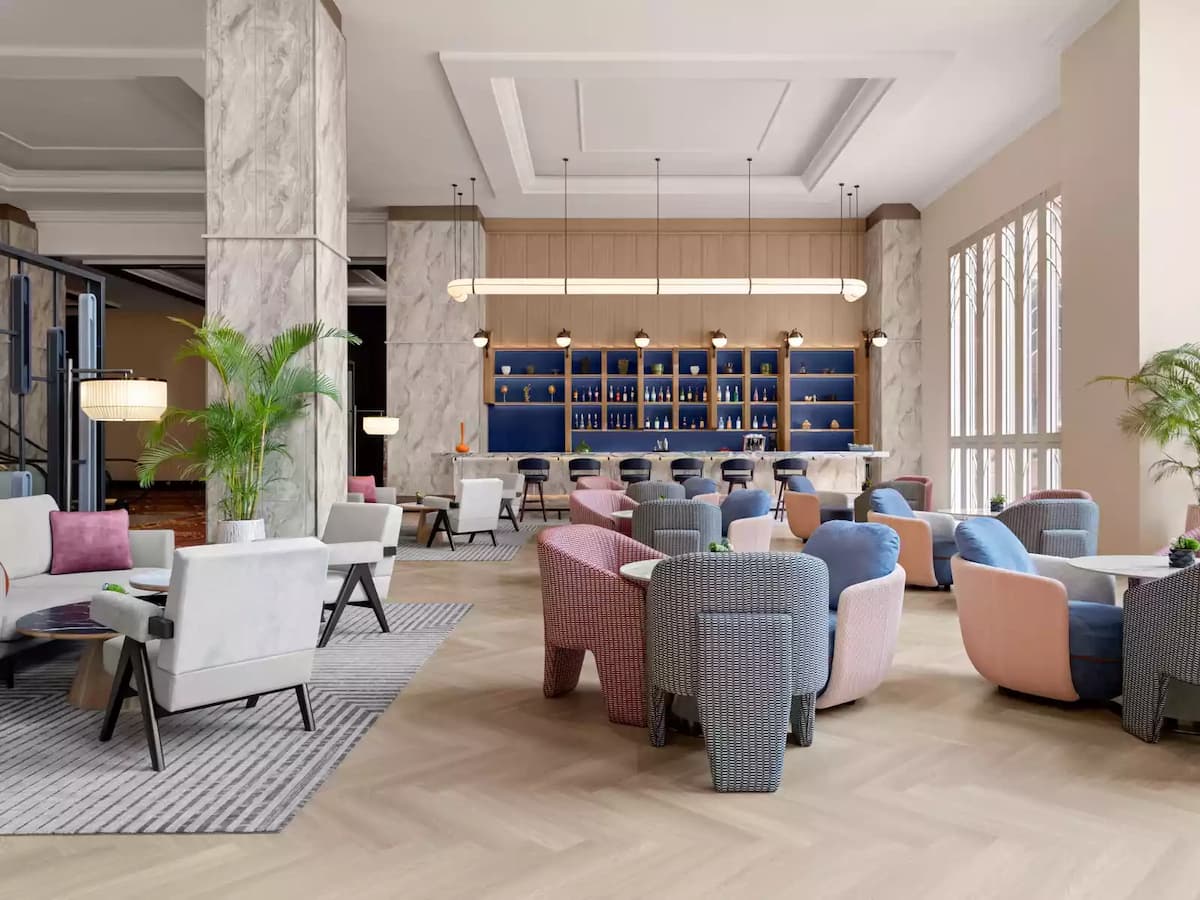 stylish lounge with plush pastel-colored-seating
