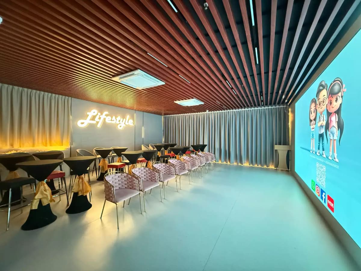 cocktail table setup facing wide screen