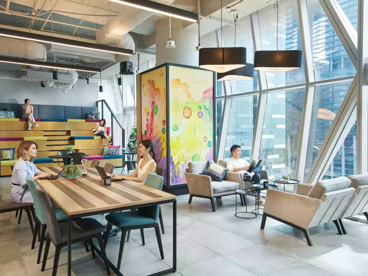 people are working at workspace area