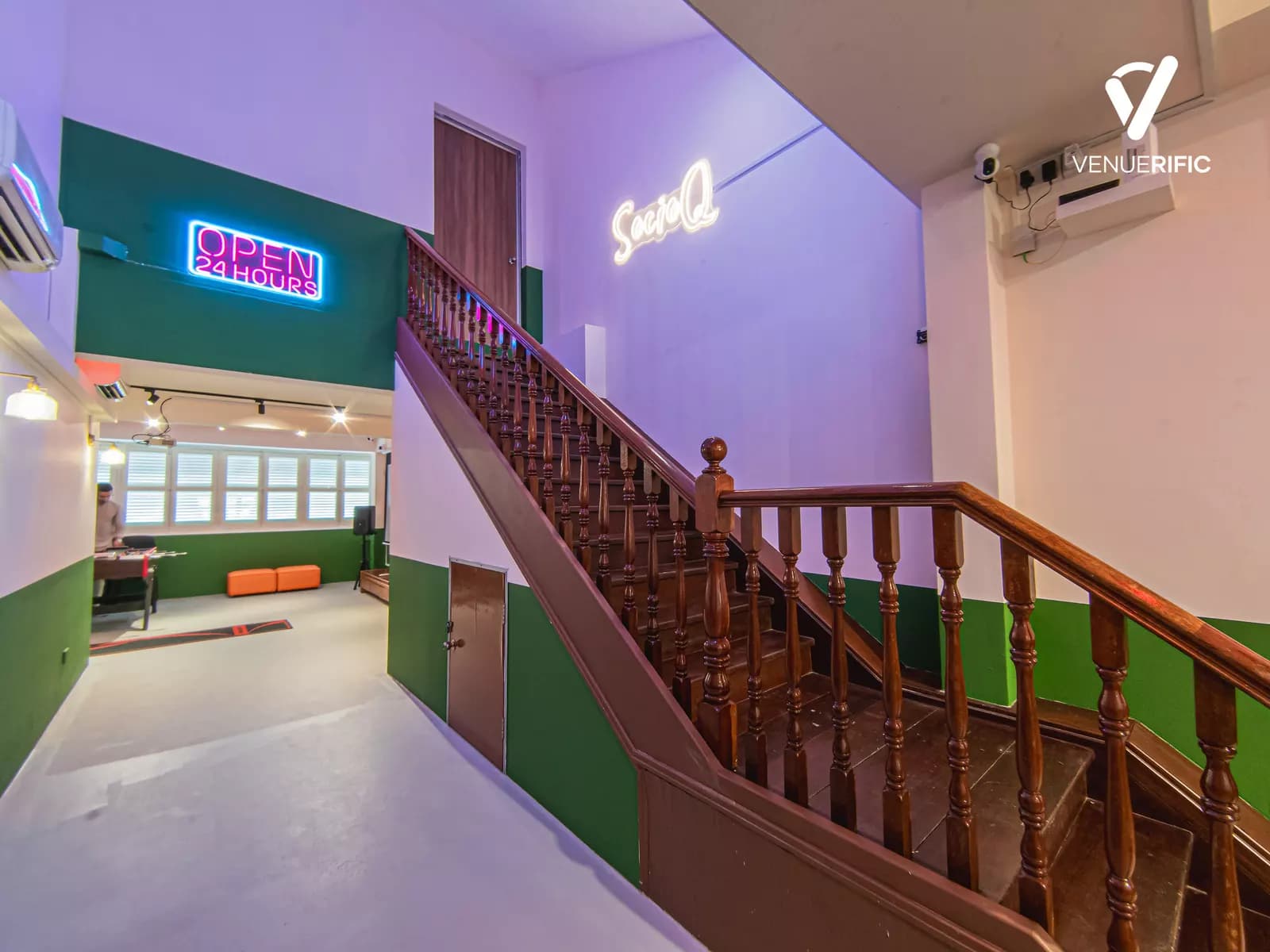 event space with wooden indoor staircase