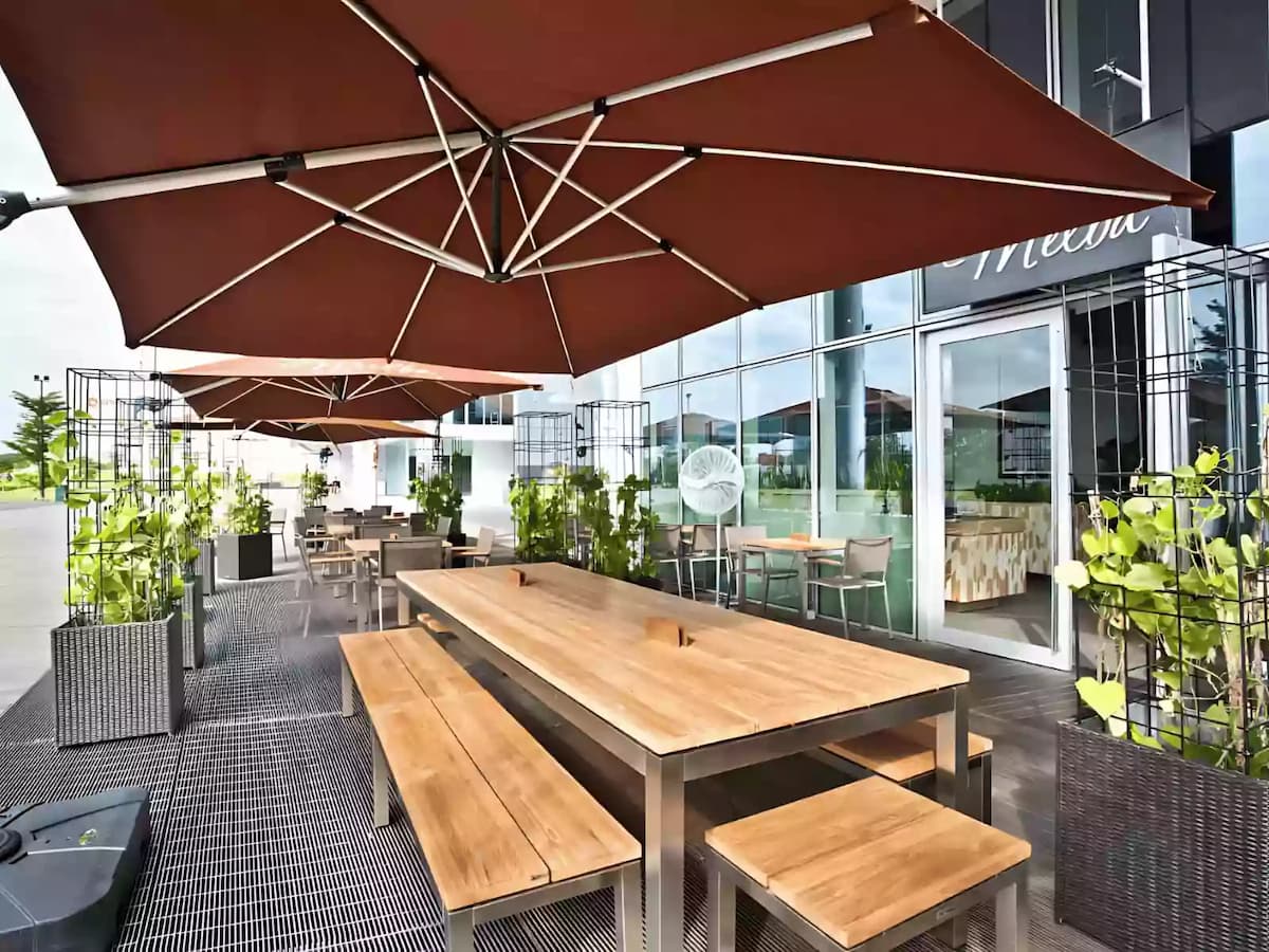 outdoor area with long wooden table